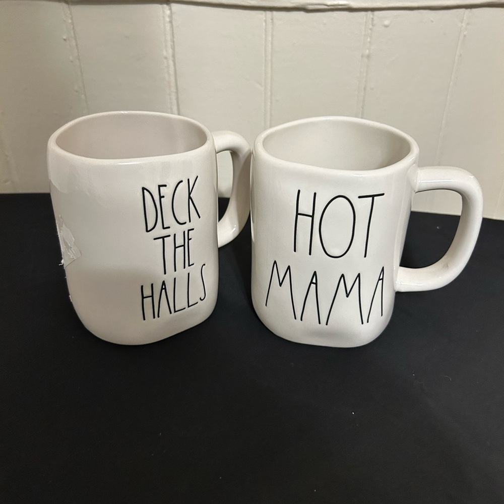 Two Rae Dunn Large White Ceramic Mugs- “Deck The Halls” & “Hot Mama”/NWOT